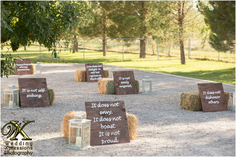 Signs at entrance of reception say what love is
