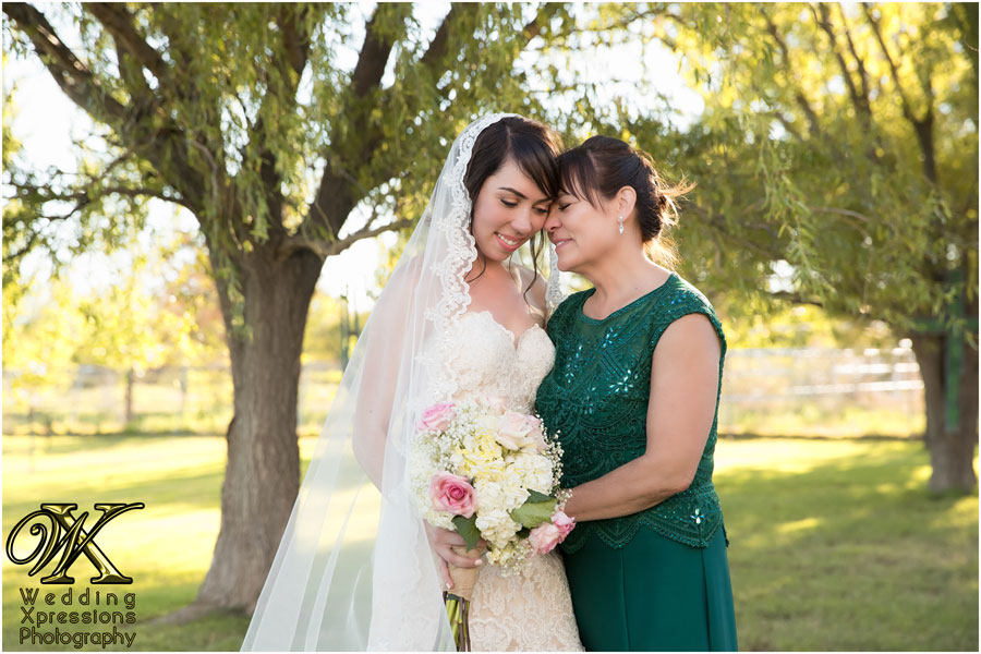 bride with mom on wedding day