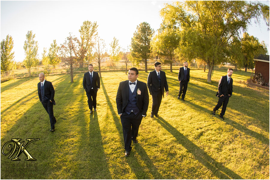 cool photography of groom with groomsmen at ranch