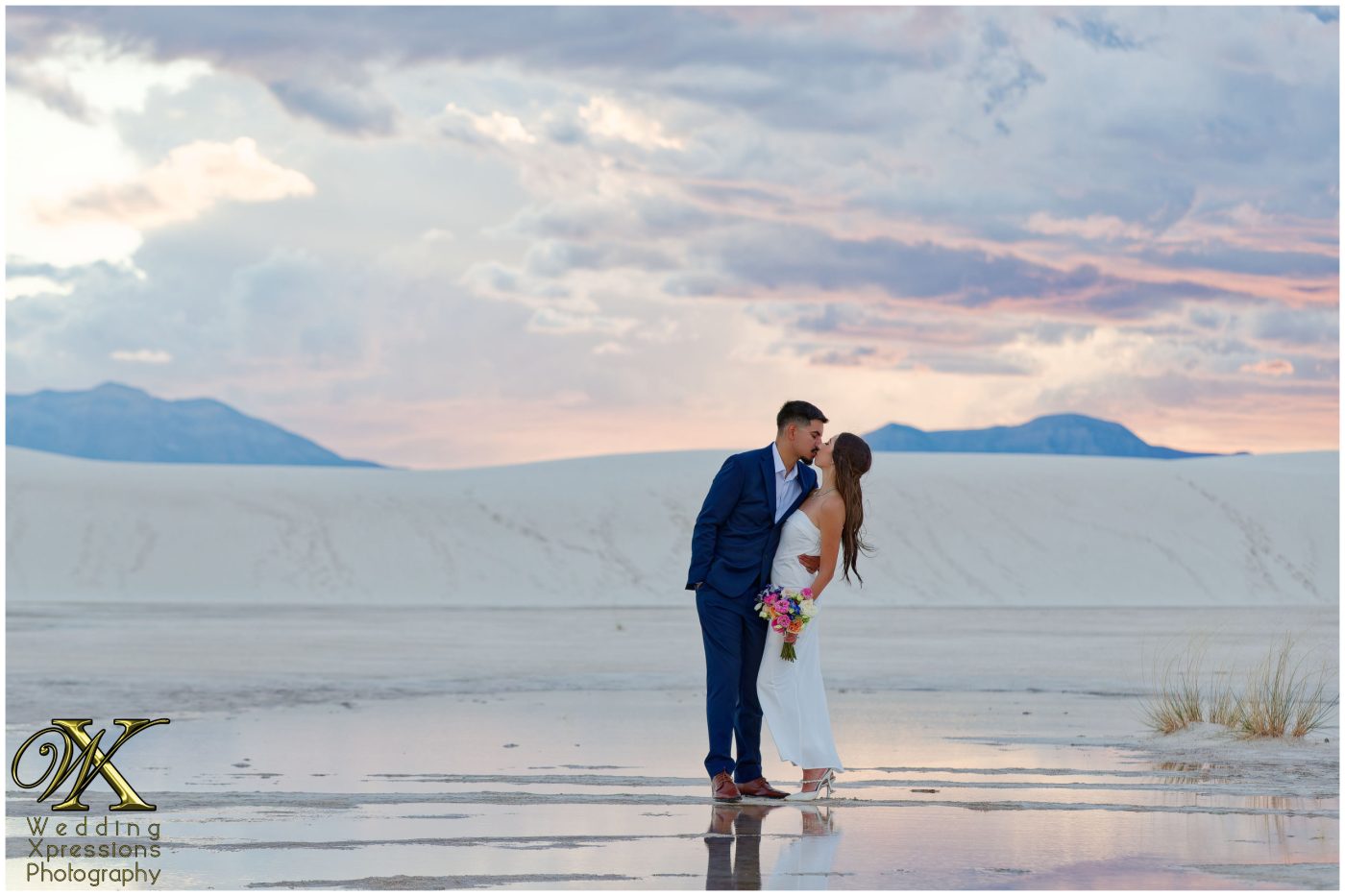 Alan and Illiana engagement session at White Sands National Park with stunning water reflection.