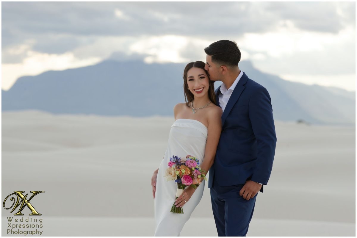 Close-up of Illiana leaning on Alan's shoulder at White Sands.