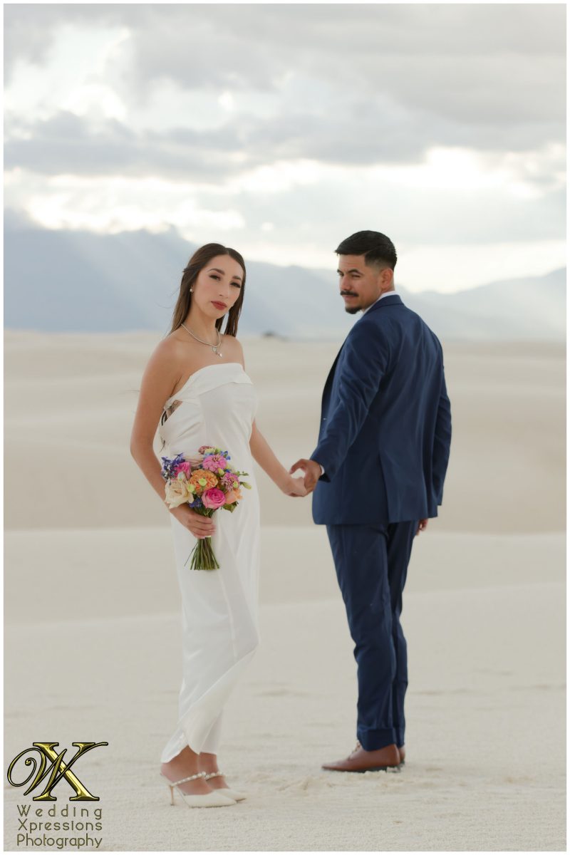 Formal attire engagement portrait at White Sands National Park.