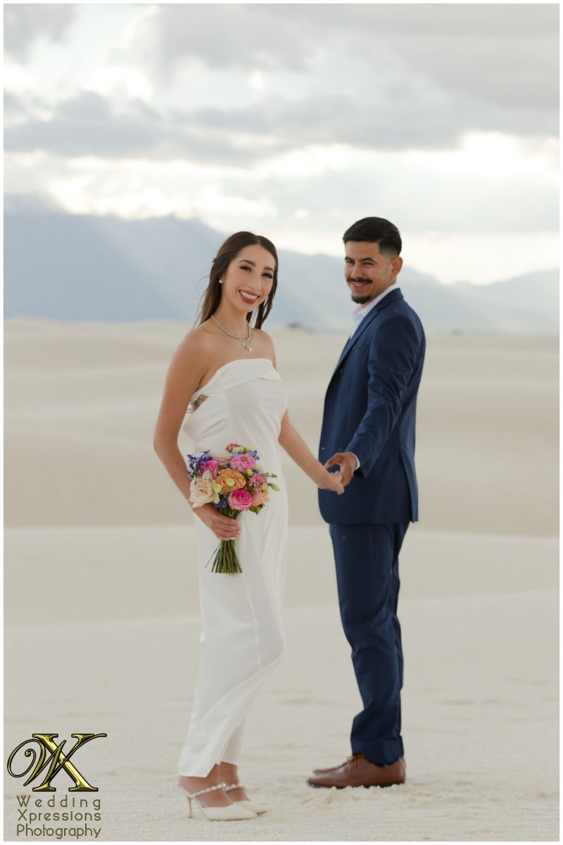 Portrait of Illiana holding a desert bouquet at White Sands.