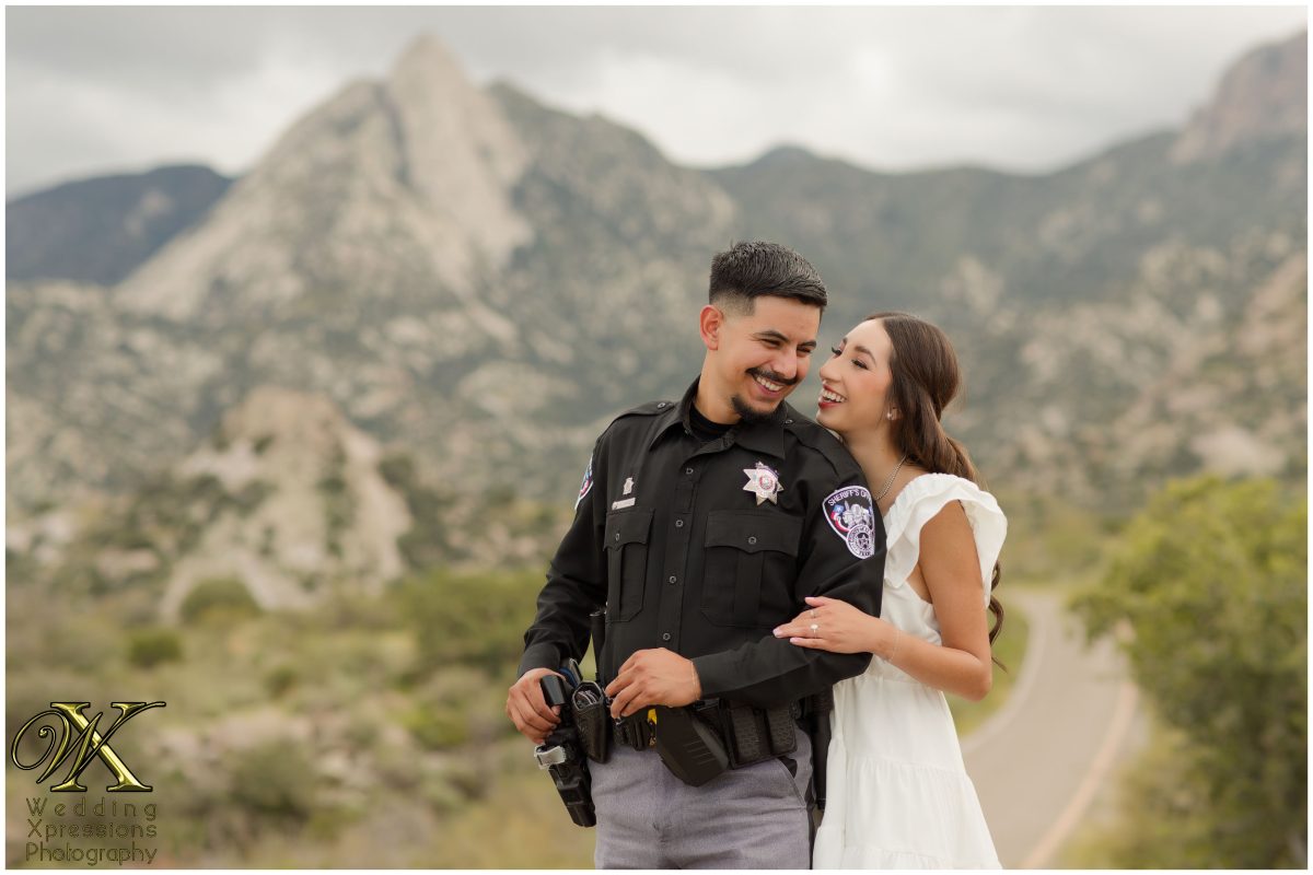Alan in his police uniform embracing Illiana at Aguirre Springs.