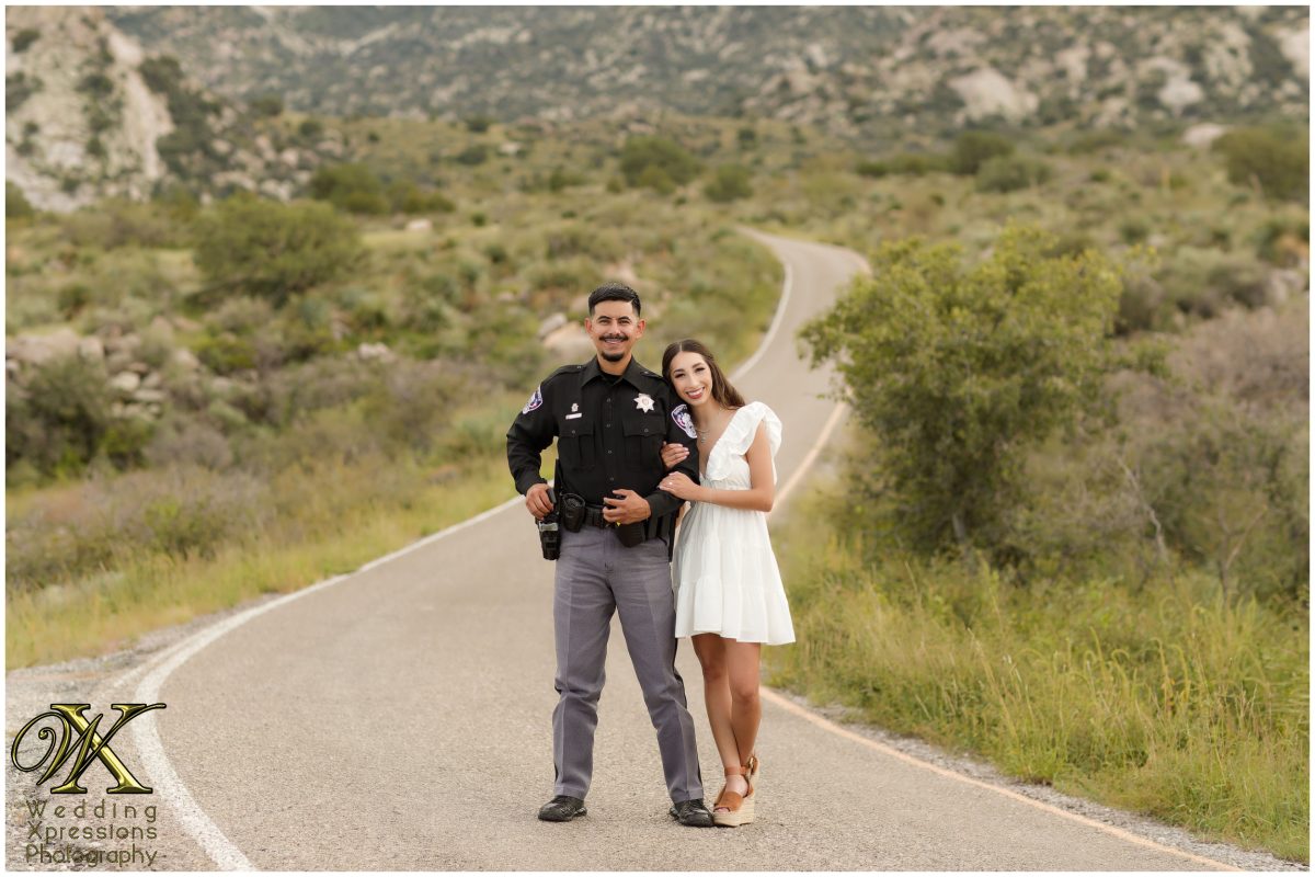 Alan and Illiana walking at Aguirre Springs in their uniforms.