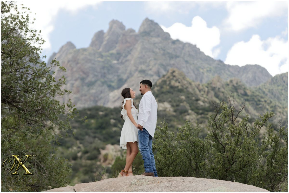 Couple looking out at the mountains at Aguirre Springs.