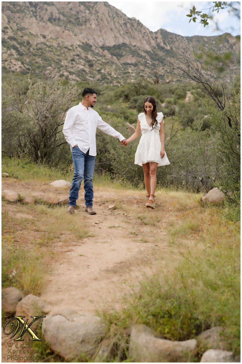 Couple walking on a trail at Aguirre Springs.