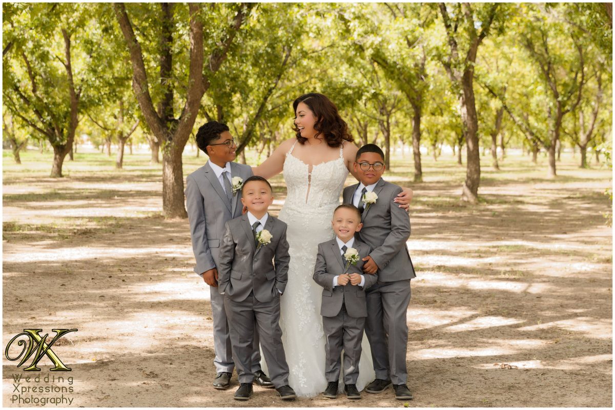 Group family portrait highlighting the beautiful bond between Melissa, and their sons.