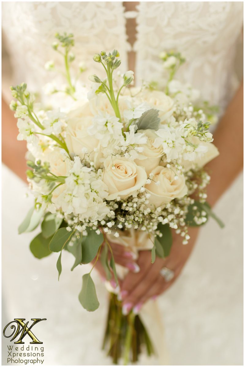 Detail shot of the elegant white bridal bouquet by Wedding Xpressions Photography.
