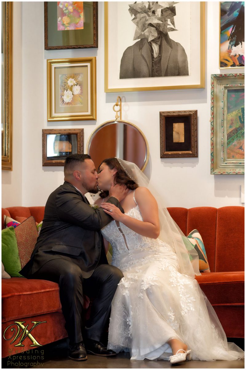 Intimate moment between the couple in the historic halls of The Plaza Hotel.