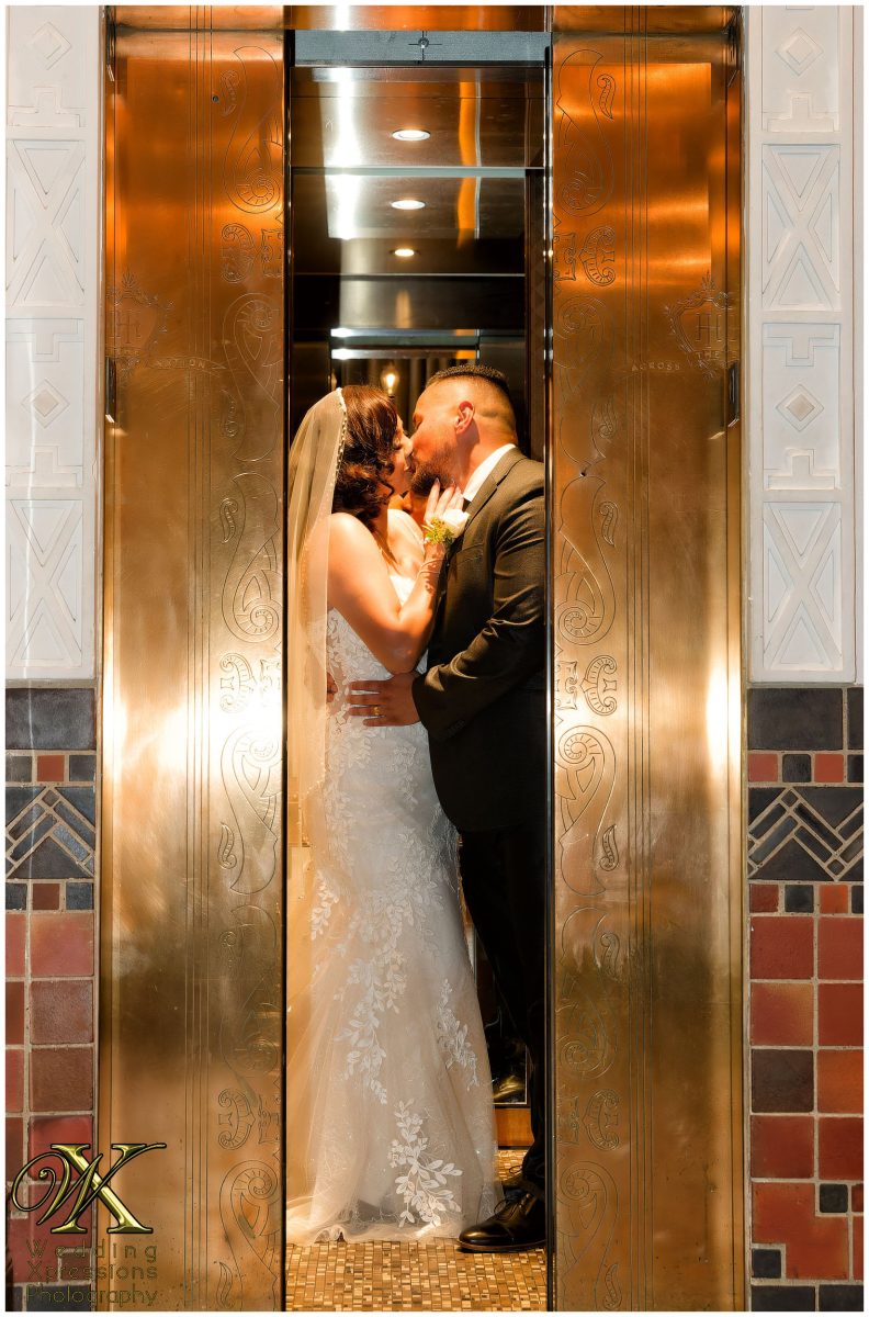 Artistic silhouette of the couple in the elevator at The Plaza Hotel Pioneer Park.
