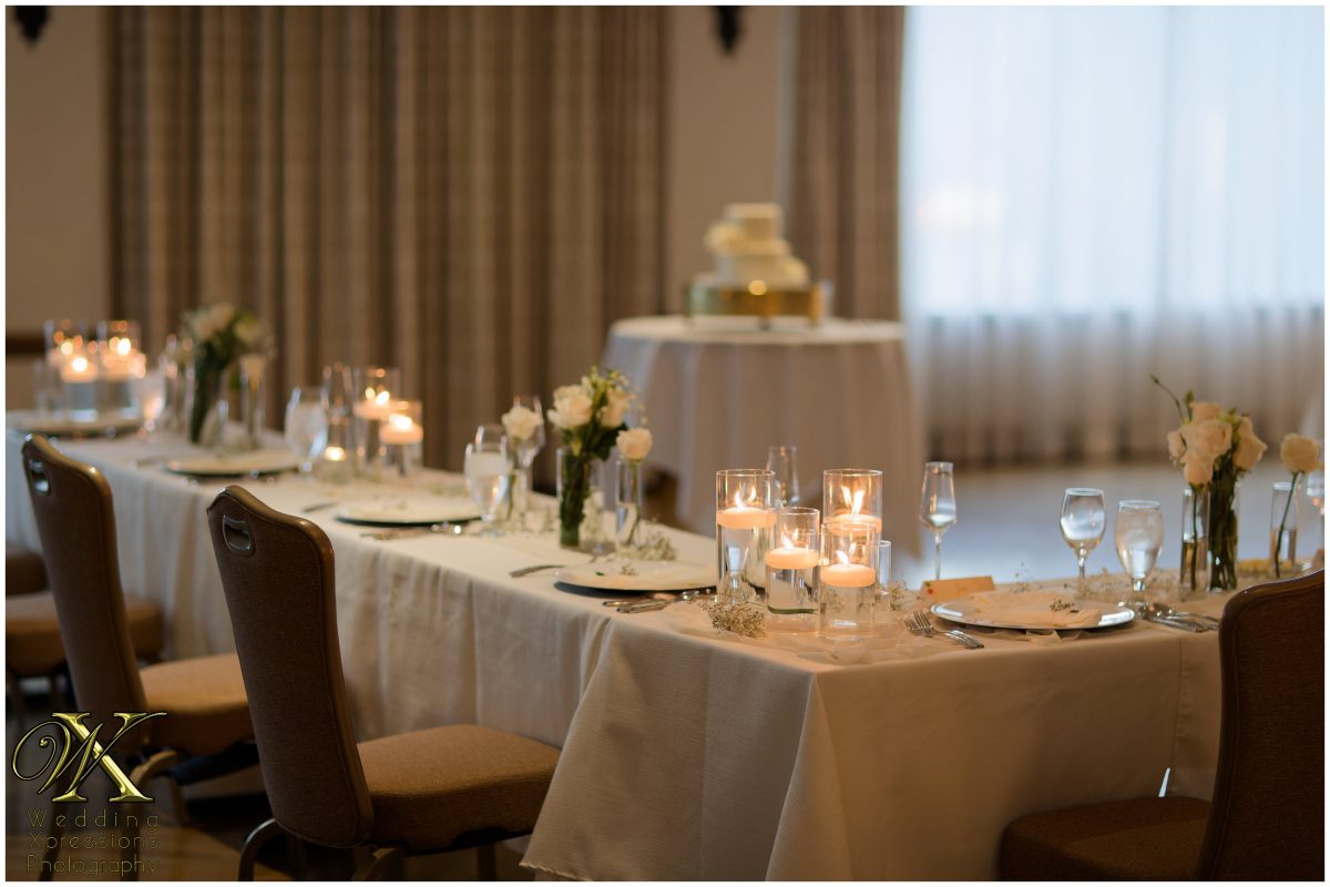 Fine art reception table details and candlelight for an upscale El Paso wedding.