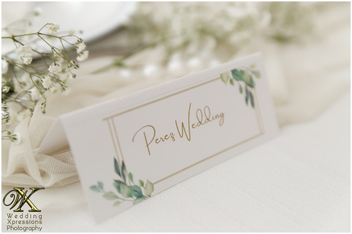 Name card detail on a luxury reception table at The Plaza Hotel Pioneer Park.