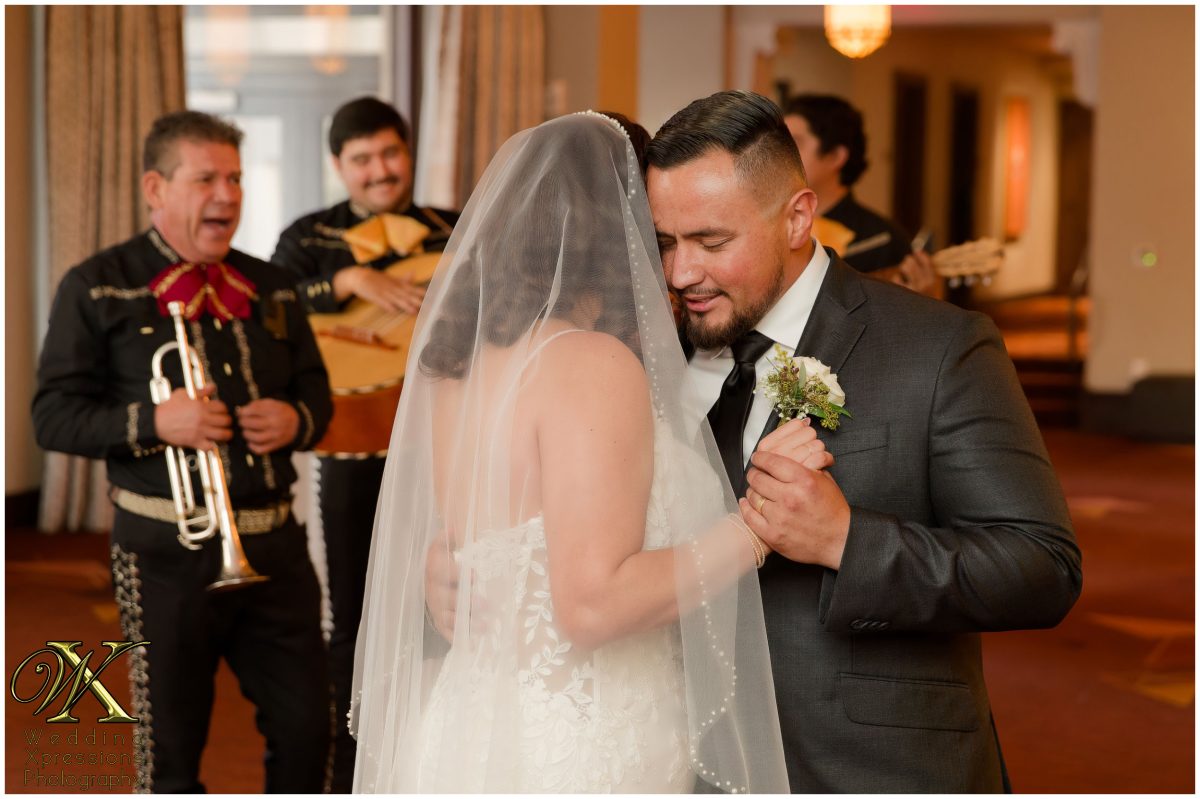Intimate moment on the dance floor, capturing the emotional depth of the day.