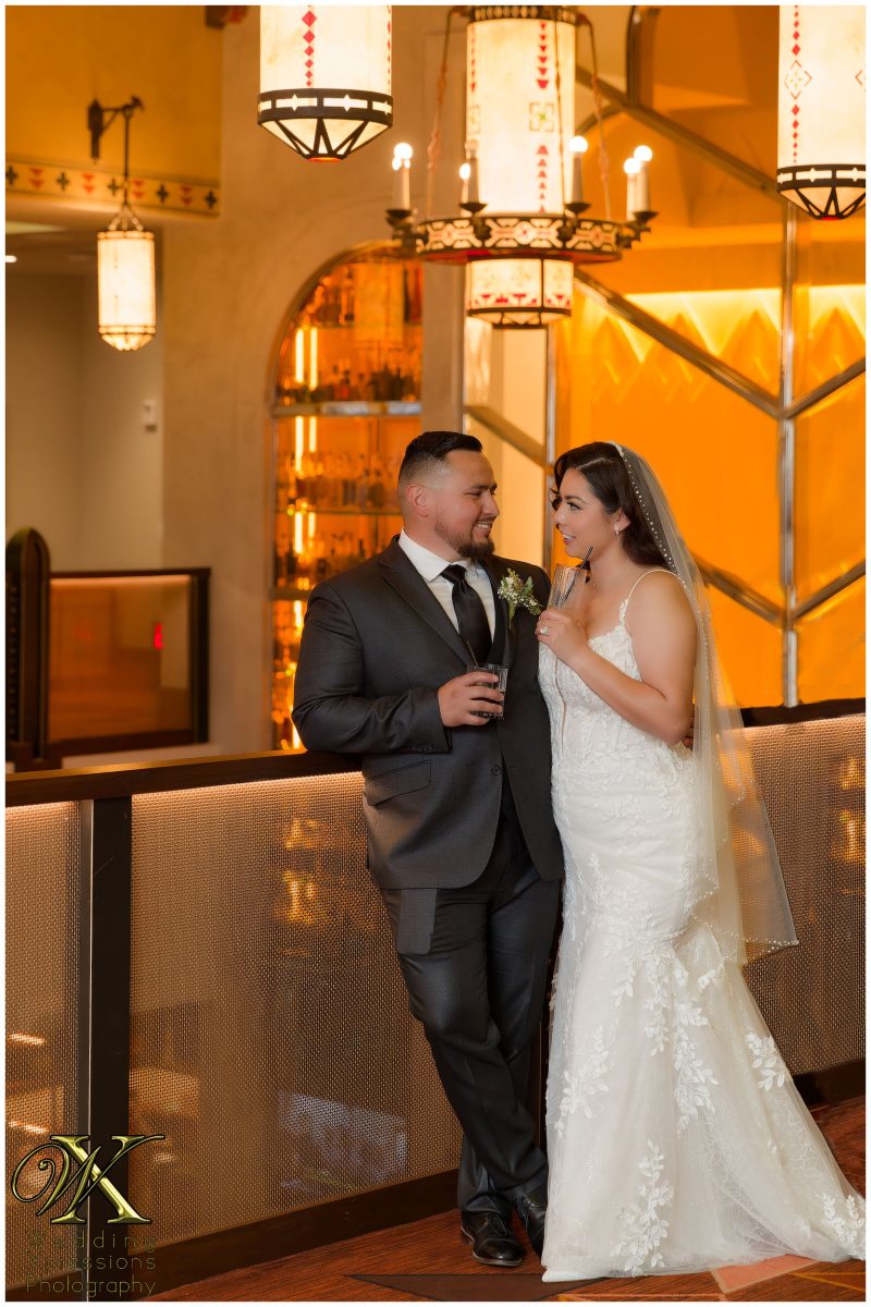Christian and Melissa sharing a toast during their wedding celebration.