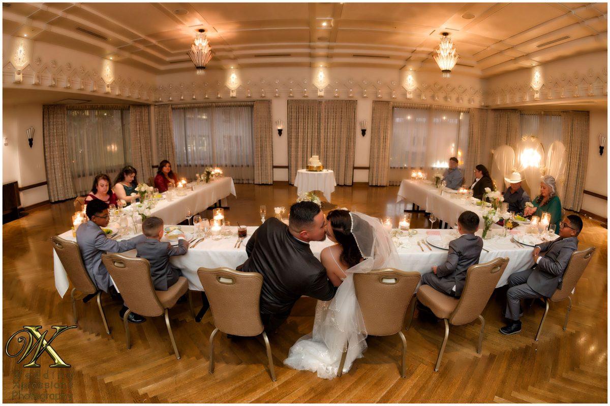 Candid and unscripted moment of joy during the wedding reception.