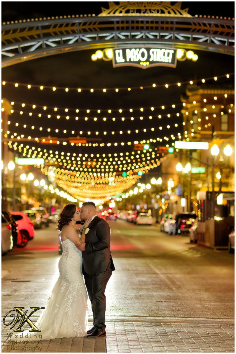 Romantic night portrait under the bistro lights in downtown El Paso.
